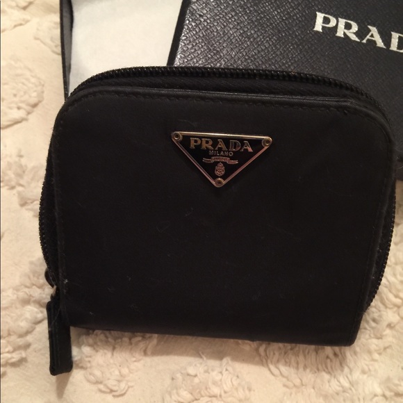 Prada Handbags - PRADA ZIP UP WALLET (Good condition) no rips